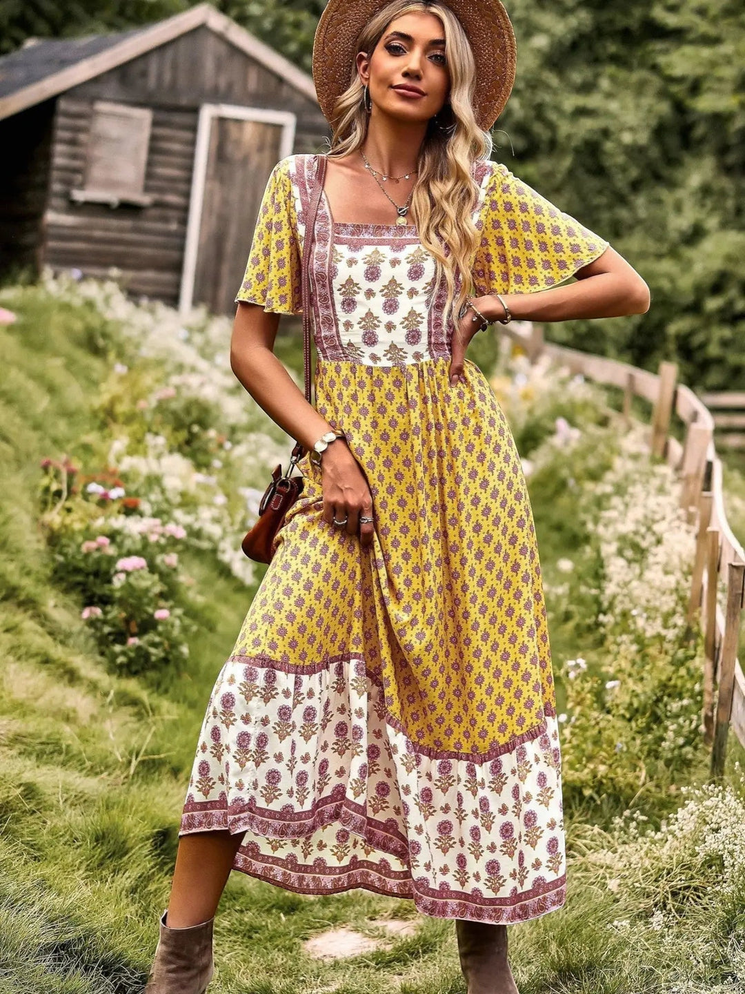 Woman wearing Bohemian Maxi Dress with ruffled, floral print — view 8 | Lunova