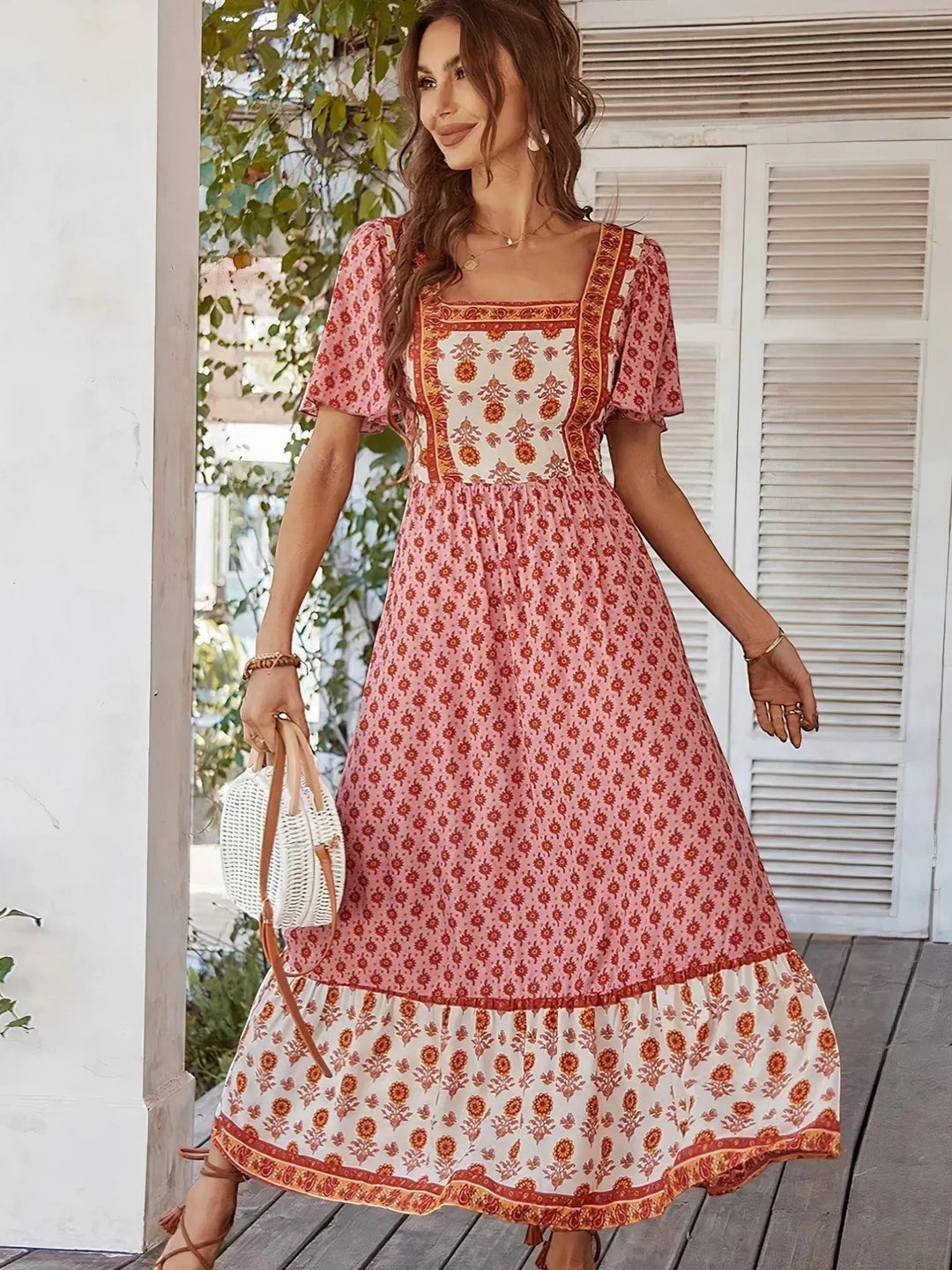 Woman wearing Bohemian Maxi Dress with ruffled, floral print — view 9 | Lunova
