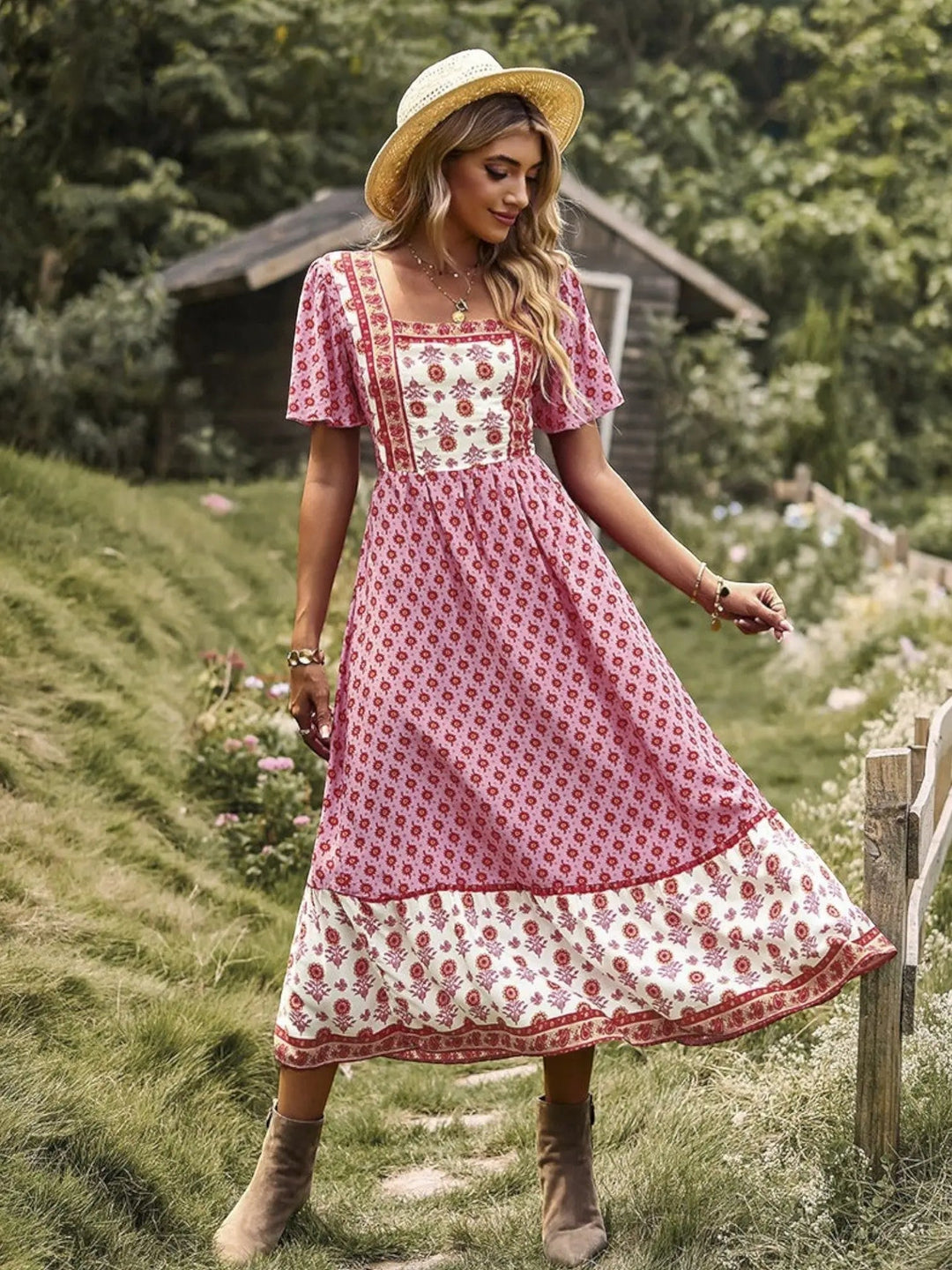 Woman wearing Pink Bohemian Maxi Dress with ruffled, floral print | Lunova