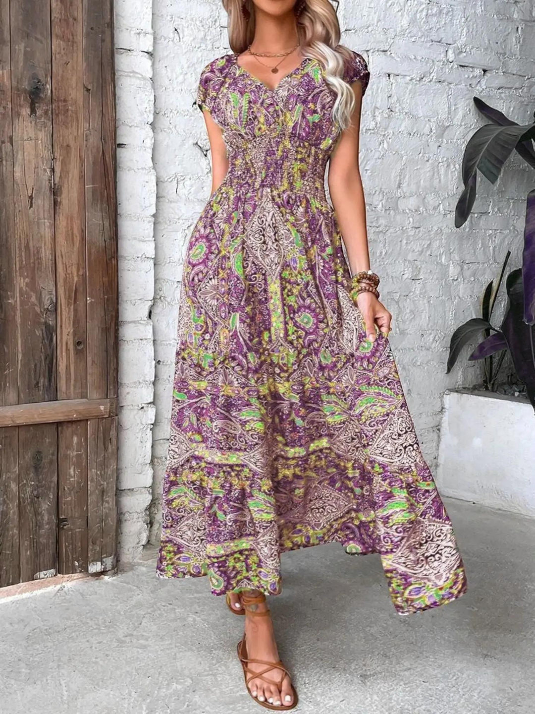Woman wearing Bohemian Maxi Dress with flowing, V-neck — view 2 | Lunova