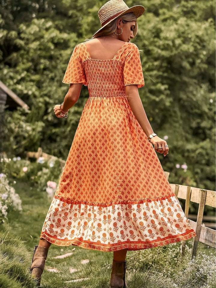 Woman wearing Bohemian Maxi Dress with ruffled, floral print — view 3 | Lunova