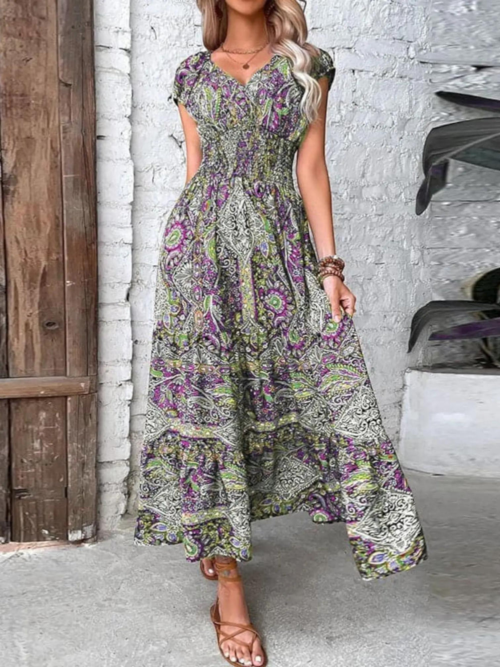 Woman wearing Bohemian Maxi Dress with flowing, V-neck — view 3 | Lunova