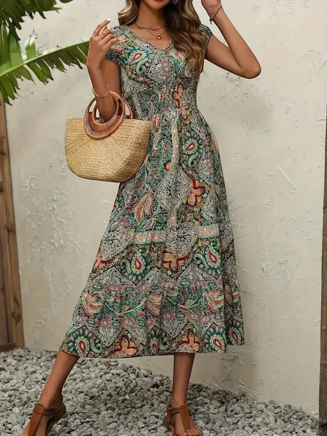 Woman wearing Green Bohemian Maxi Dress with flowing, V-neck | Lunova