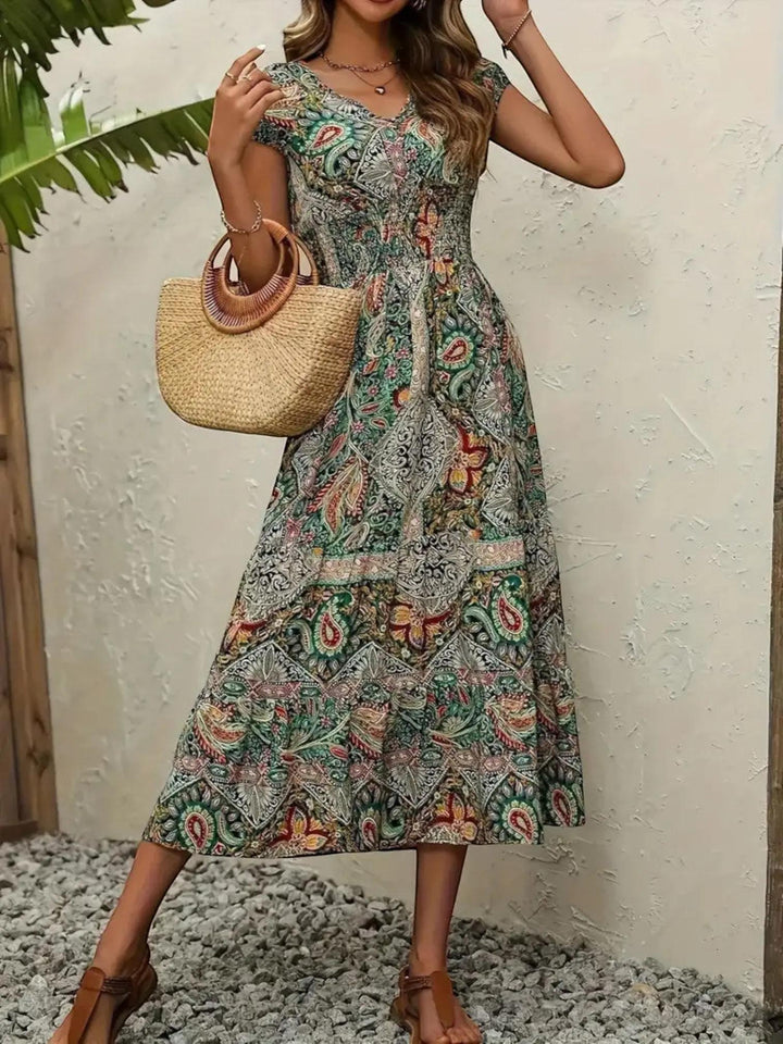Woman wearing Green Bohemian Maxi Dress with flowing, V-neck | Lunova