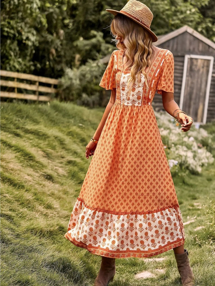 Woman wearing Bohemian Maxi Dress with ruffled, floral print — view 4 | Lunova