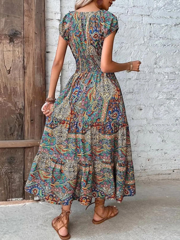 Woman wearing Bohemian Maxi Dress with flowing, V-neck — view 5 | Lunova