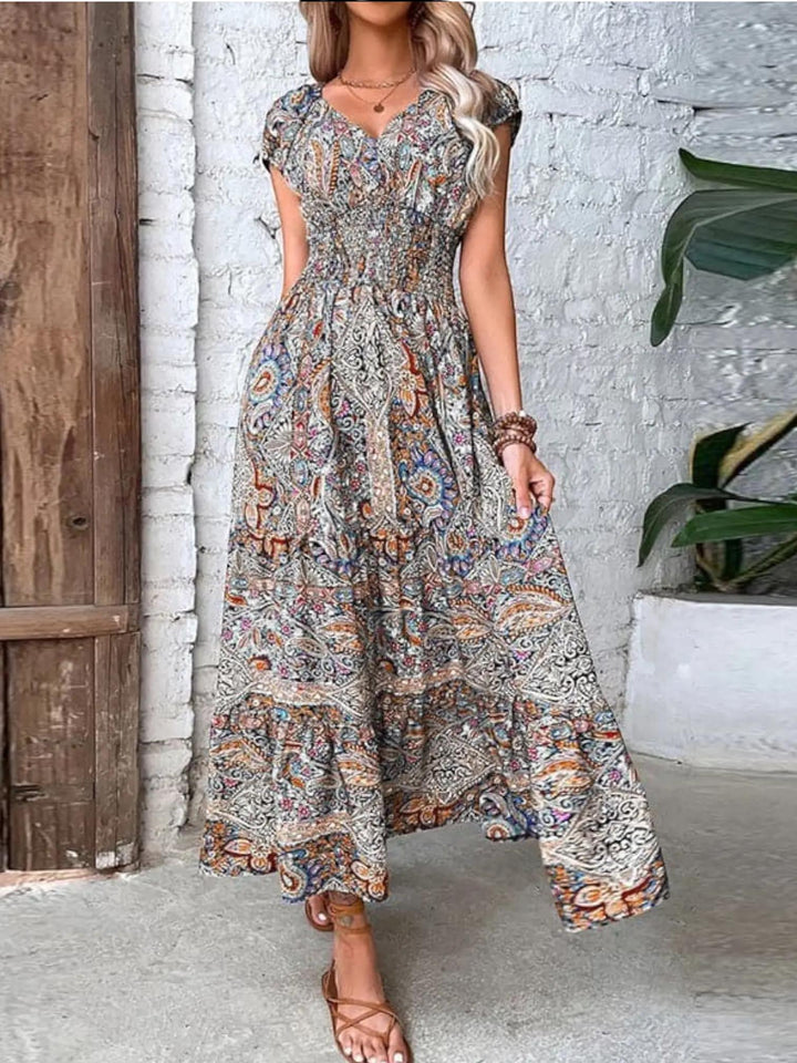 Woman wearing Brown Bohemian Maxi Dress with flowing, V-neck | Lunova