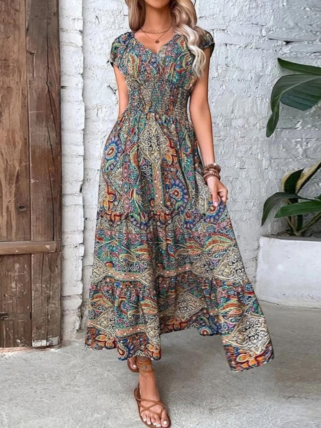 Woman wearing Blue Bohemian Maxi Dress with flowing, V-neck | Lunova