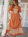 Woman wearing Bohemian Maxi Dress with ruffled, floral print | Lunova