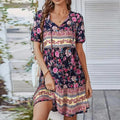Woman wearing Blue Bohemian Midi Dress with empire-waist, V-neck | Lunova