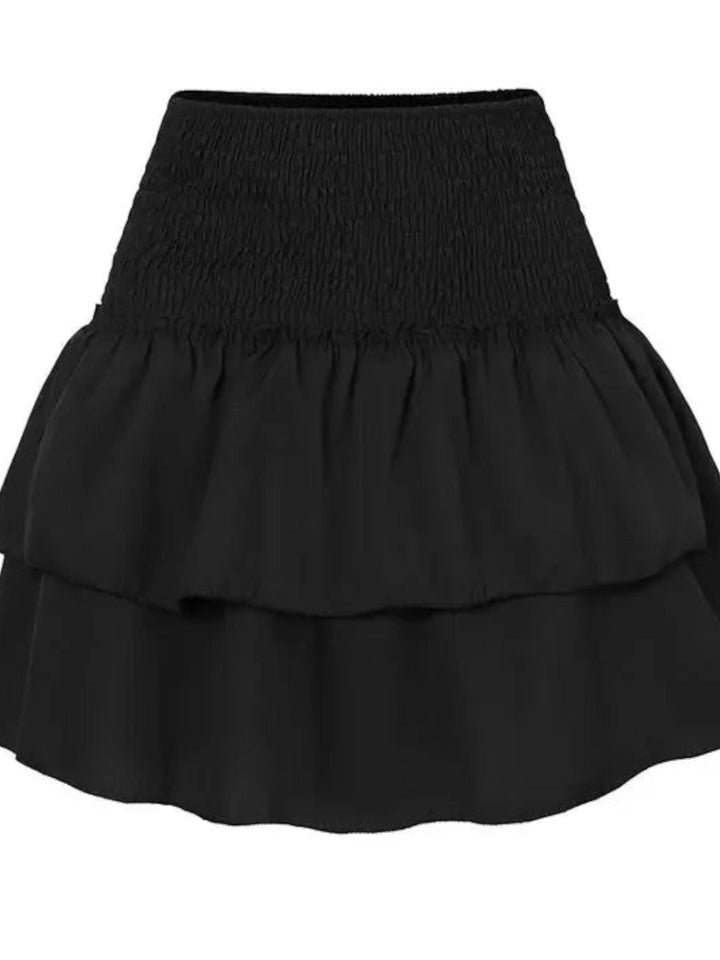 Woman wearing Black Bohemian Mini Skirt with relaxed | Lunova