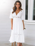 Woman wearing White Boho Midi Dress with empire-waist, V-neck | Lunova