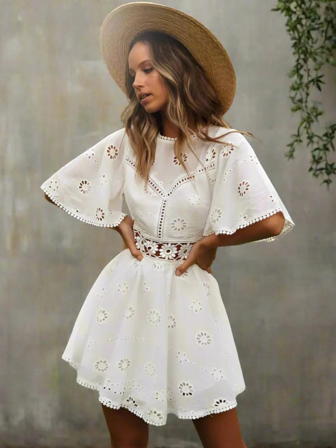 Woman wearing White Chic Mini Dress with A-line, empire-waist | Lunova