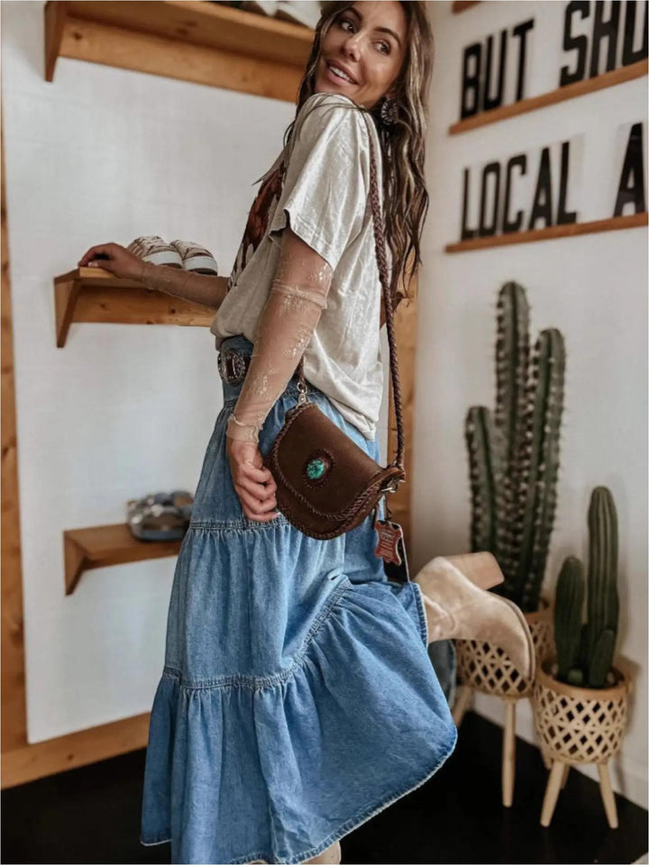 Woman wearing Denim Maxi Skirt with A-line, tiered — view 2 | Lunova