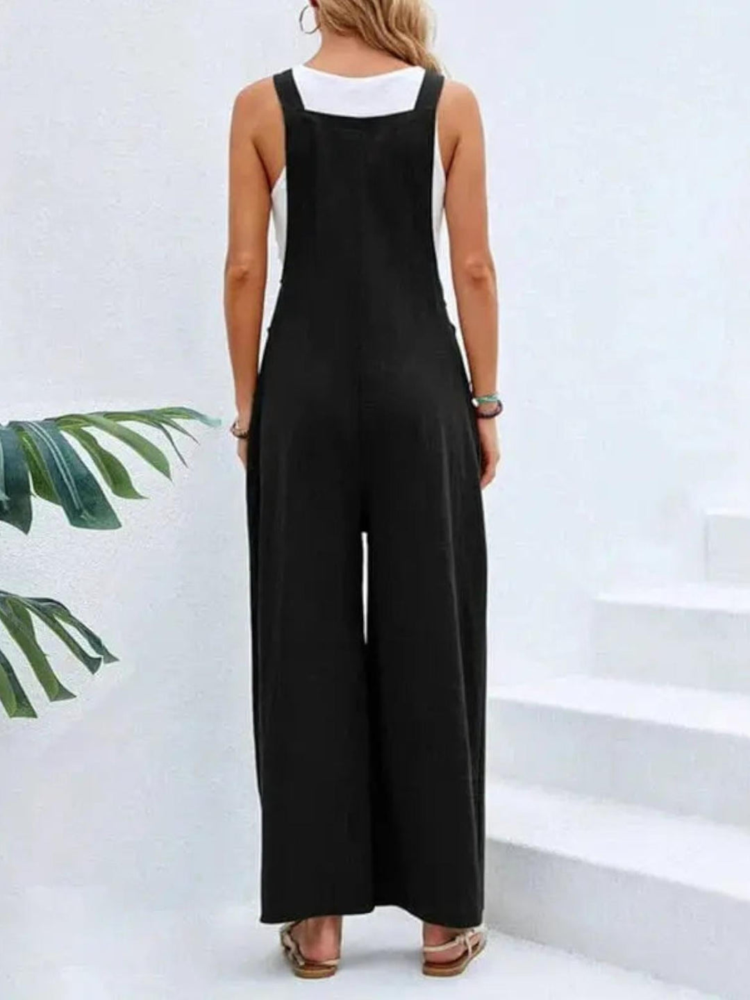 Woman wearing Flare Leg Jumpsuit Overall with drawstring, relaxed — view 2 | Lunova