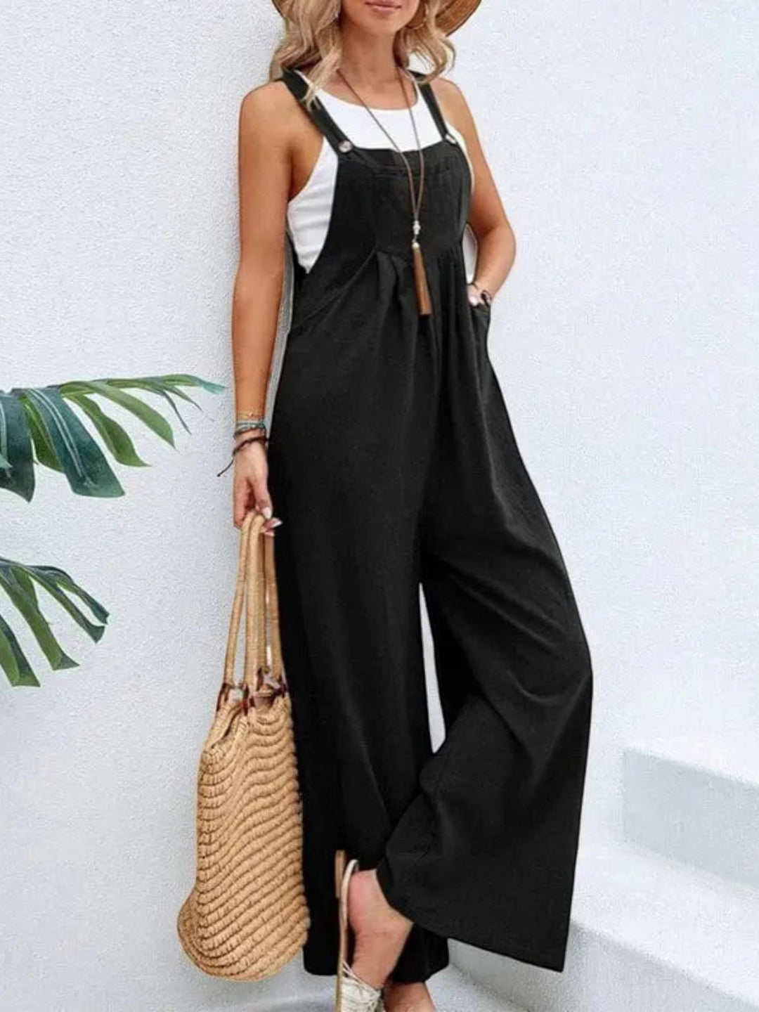 Woman wearing Black Flare Leg Jumpsuit Overall with drawstring, relaxed | Lunova