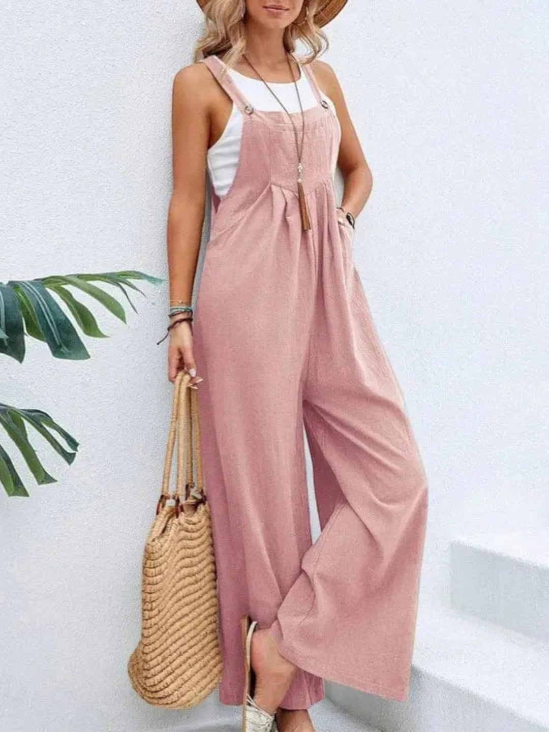 Woman wearing Pink Flare Leg Jumpsuit Overall with drawstring, relaxed | Lunova