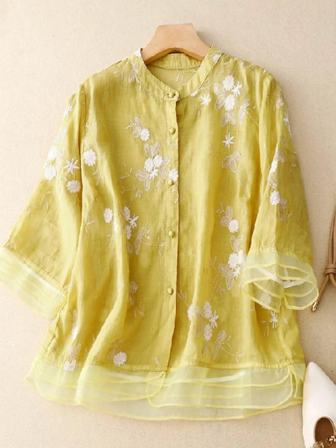 Woman wearing Yellow Floral Blouse with relaxed | Lunova