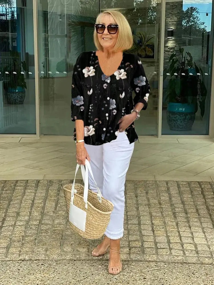 Woman wearing Black Floral Button Blouse with button-front, relaxed | Lunova