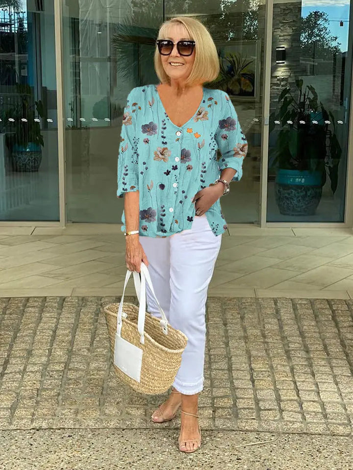 Woman wearing Floral Button Blouse with button-front, relaxed | Lunova