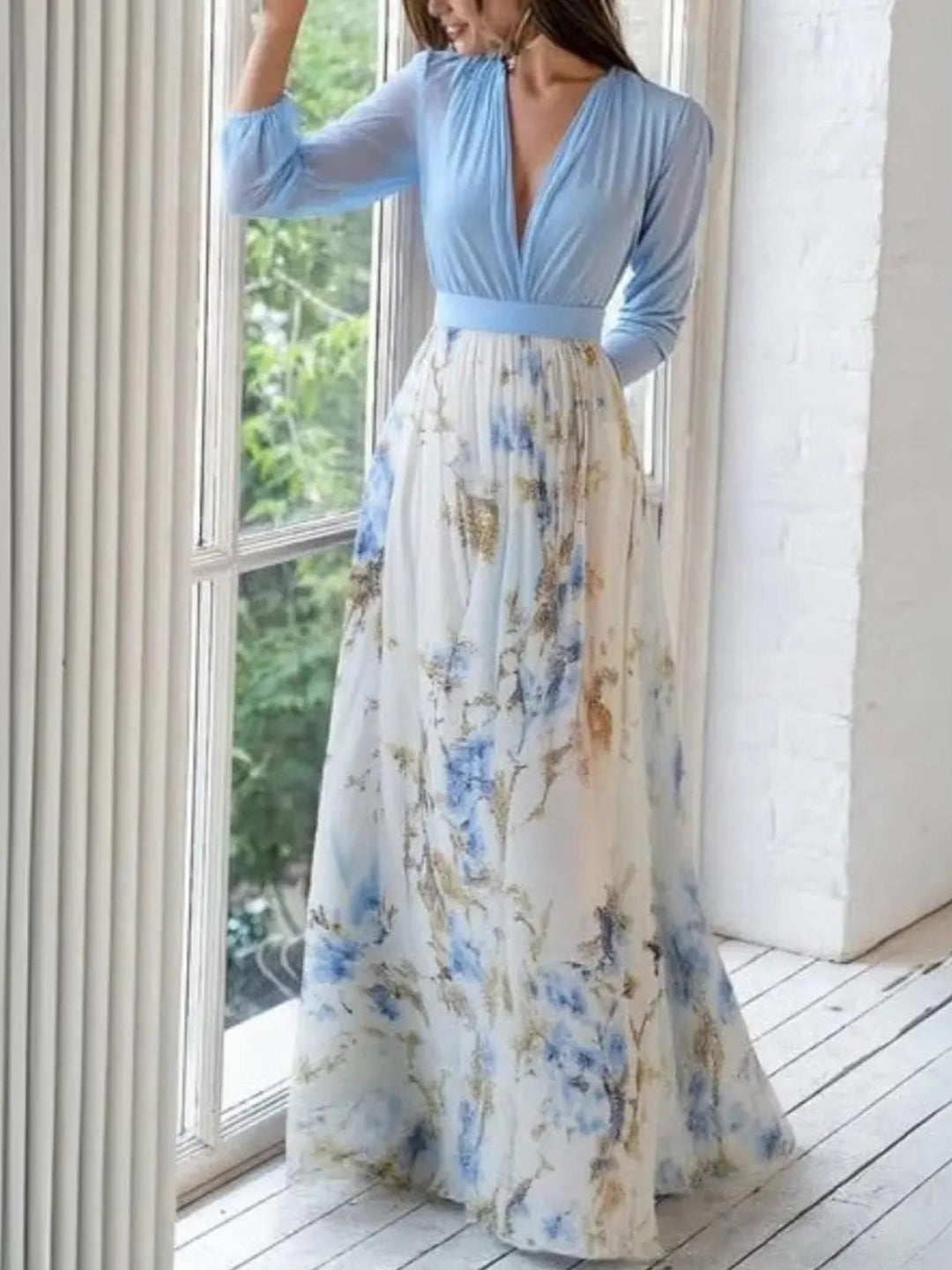 Woman wearing Blue Floral Maxi Dress with V-neck | Lunova