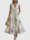 Woman wearing Apricot Floral Maxi Dress with A-line, flowing | Lunova