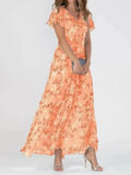 Woman wearing Orange Floral Maxi Dress with V-neck | Lunova