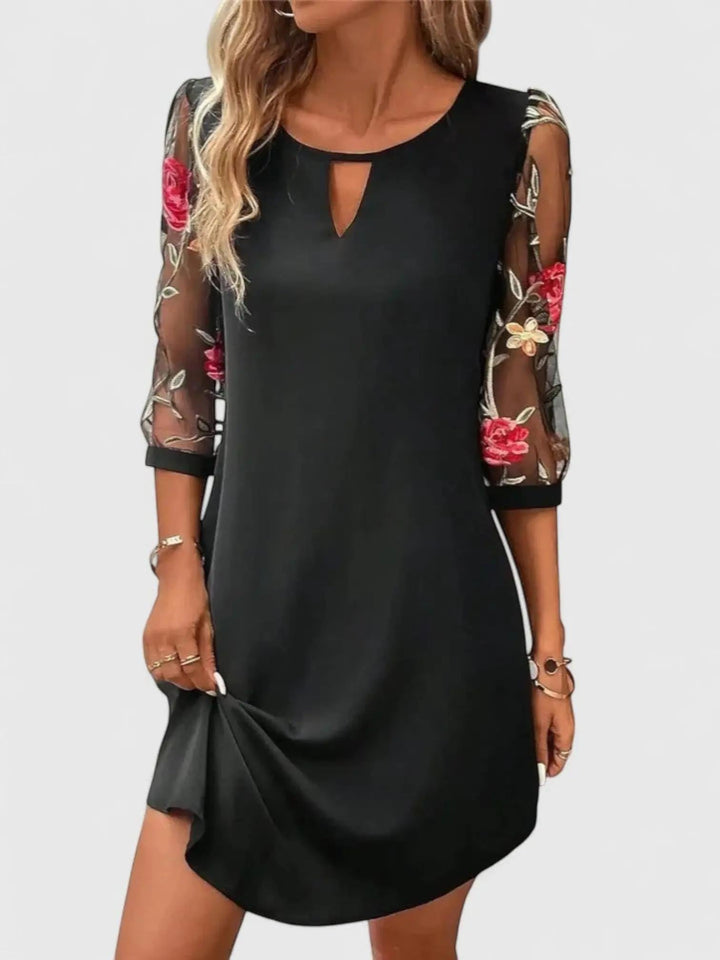 Woman wearing Black Floral Midi Dress | Lunova