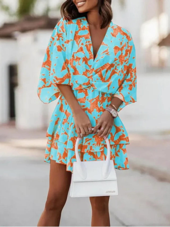 Woman wearing Blue Floral Mini Dress with A-line, empire-waist | Lunova