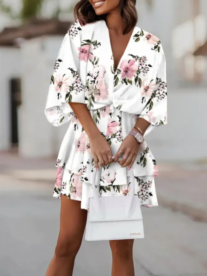Woman wearing White Floral Mini Dress with A-line, empire-waist | Lunova