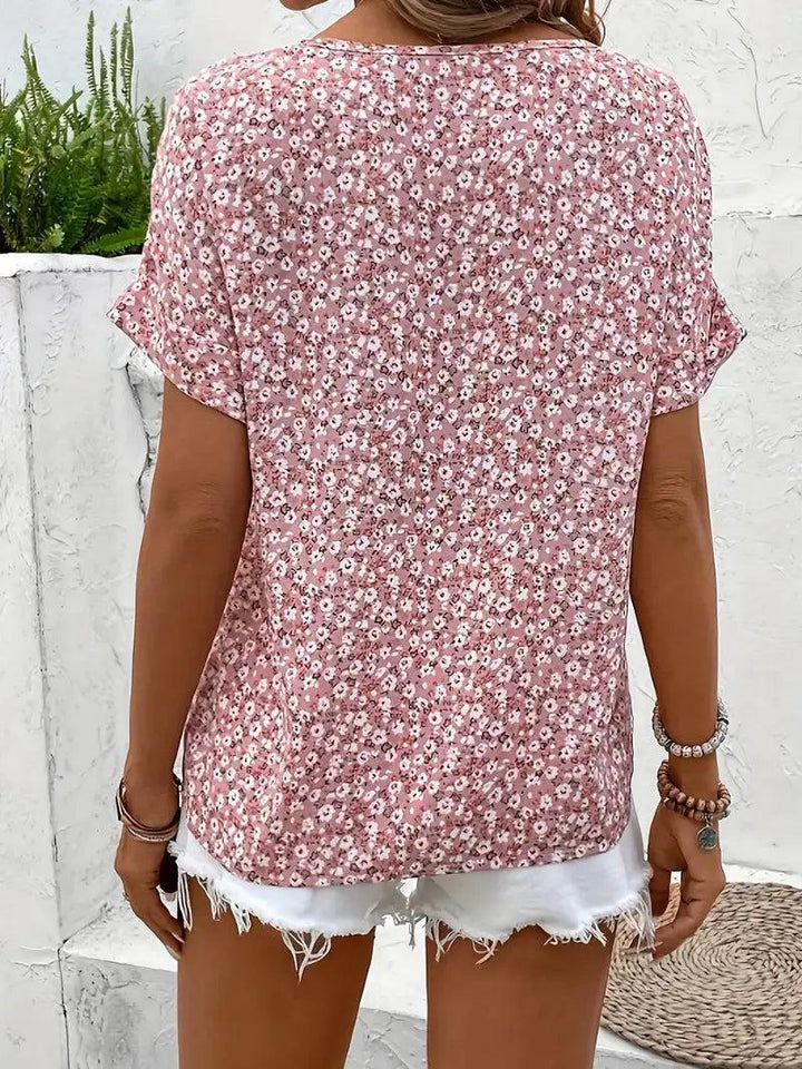 Woman wearing Floral Print Blouse with button-front, relaxed — view 2 | Lunova