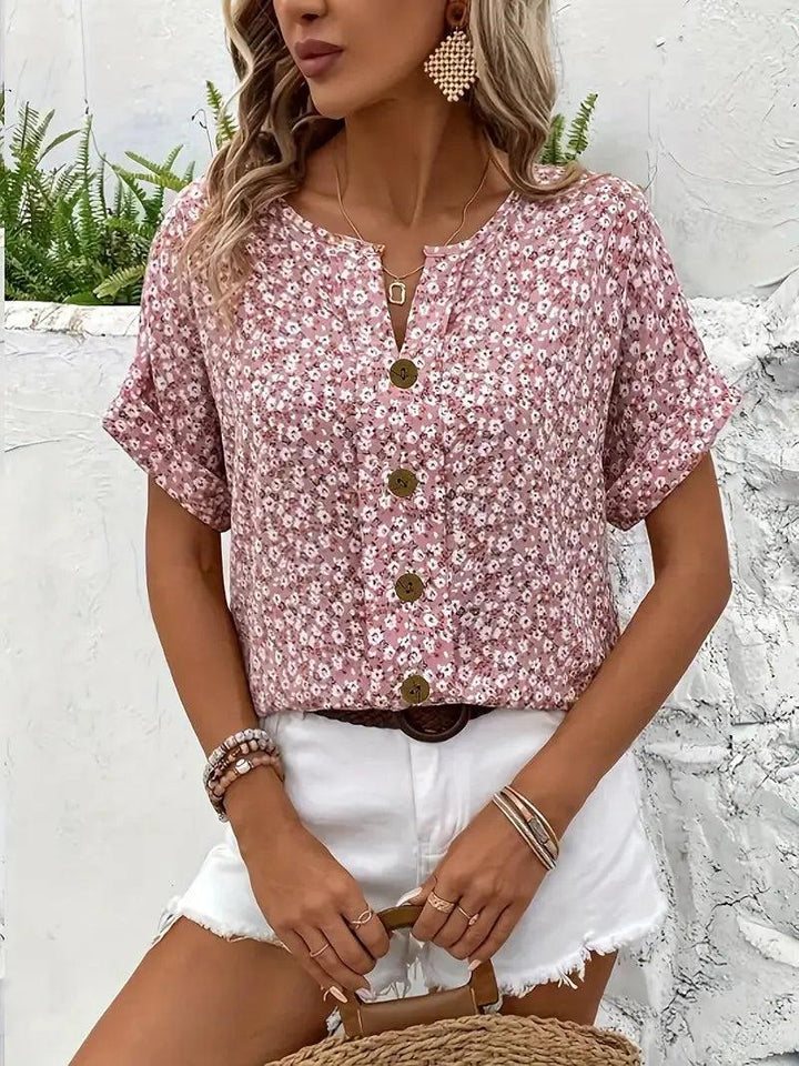 Woman wearing Pink Floral Print Blouse with button-front, relaxed | Lunova