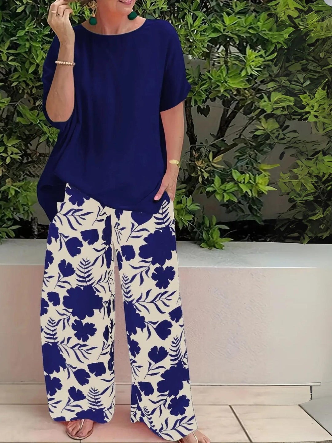 Woman wearing Navy Floral Two-Piece Set with wide-leg | Lunova