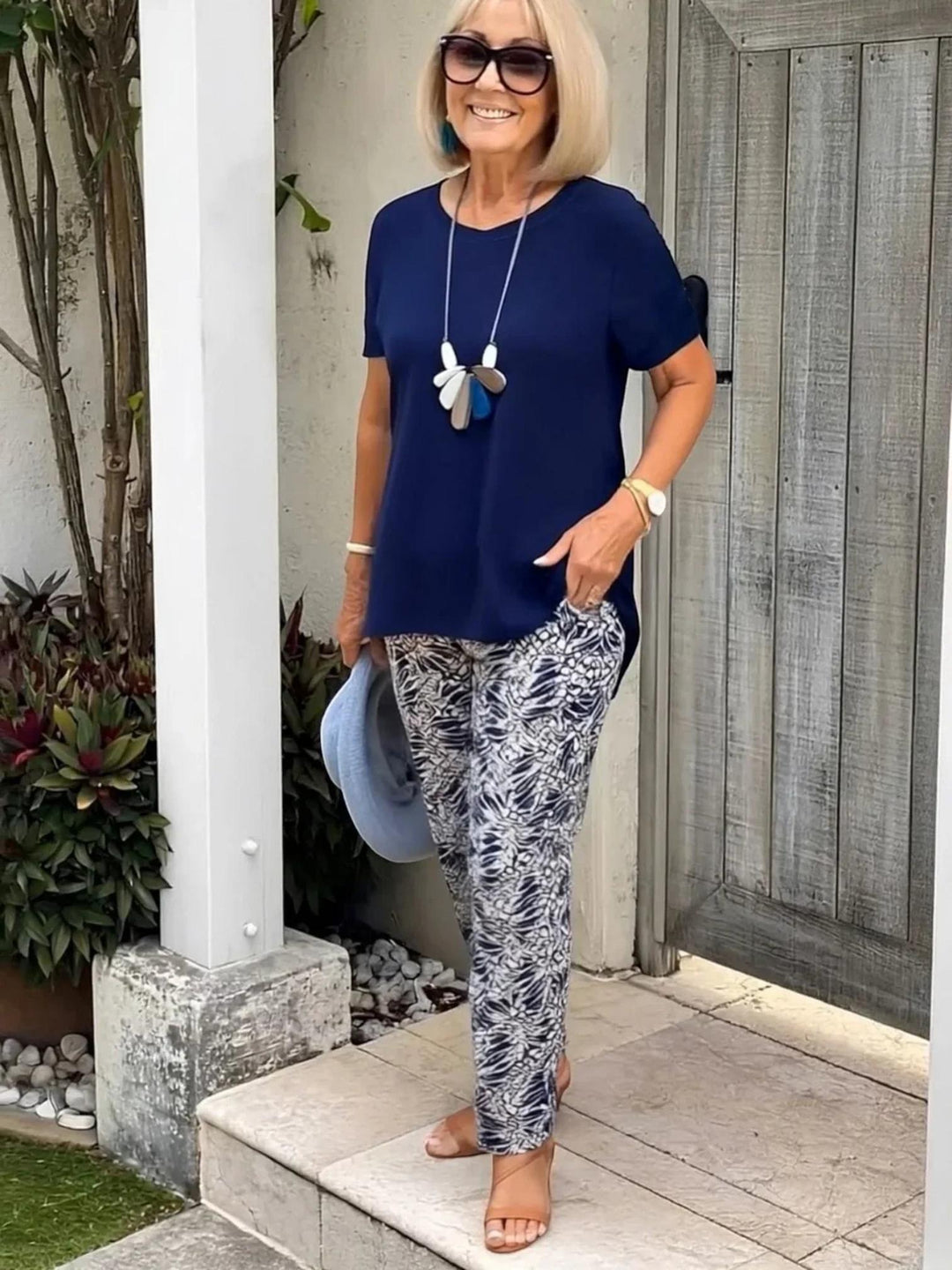Woman wearing Navy Floral Two-Piece Set | Lunova