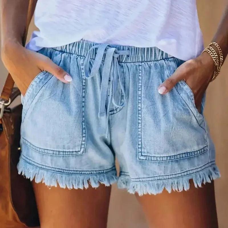 Woman wearing Light Blue Frayed Denim Shorts with drawstring | Lunova