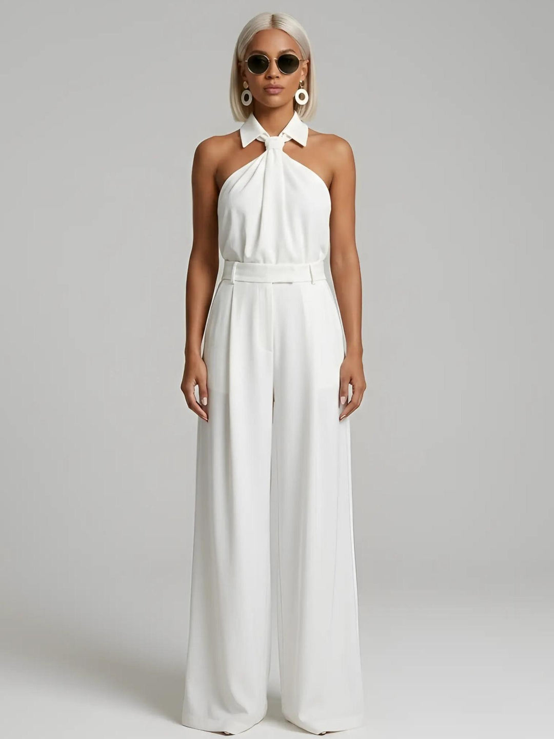 Woman wearing White Halter Wide-Leg Jumpsuit with halter, full-length | Lunova