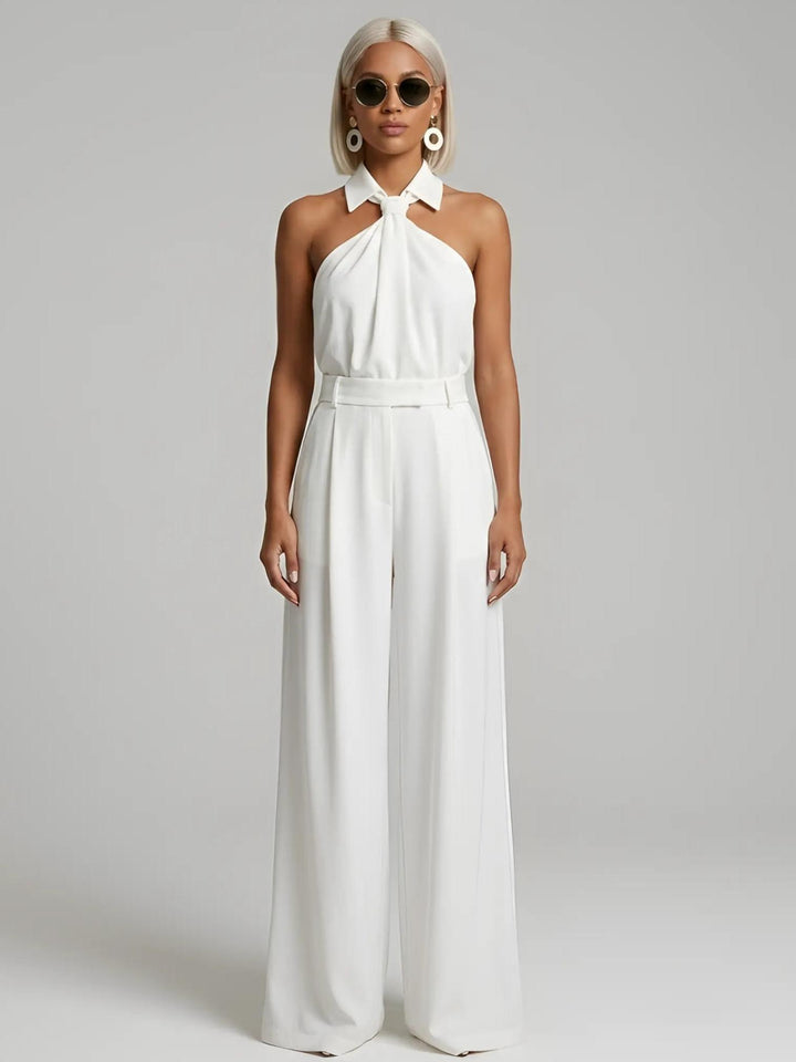 Woman wearing White Halter Wide-Leg Jumpsuit with halter, full-length | Lunova