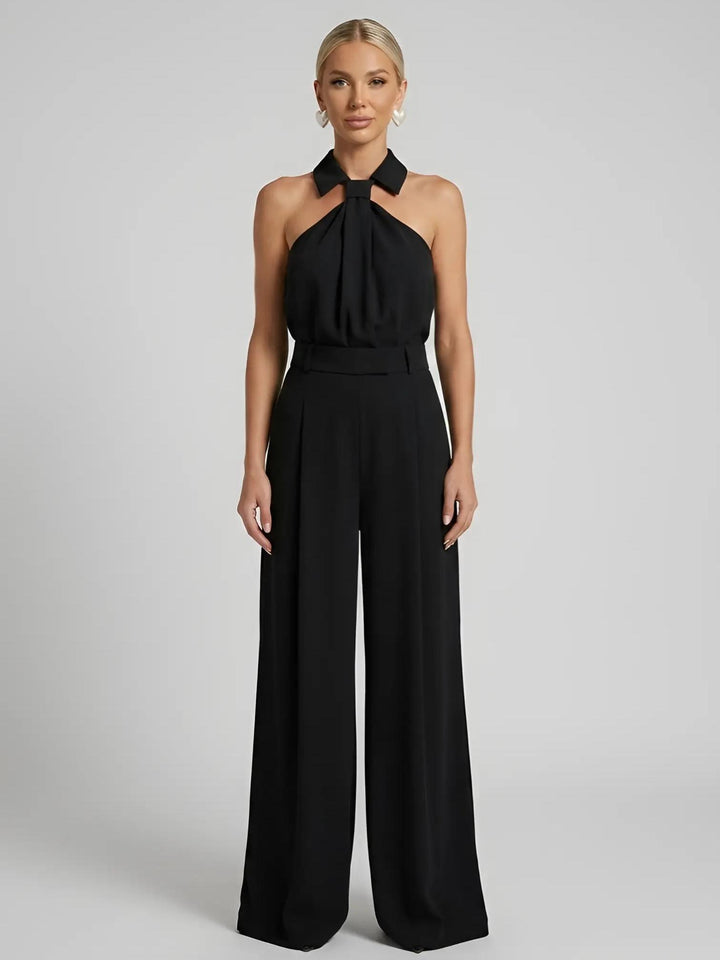 Woman wearing Black Halter Wide-Leg Jumpsuit with halter, full-length | Lunova
