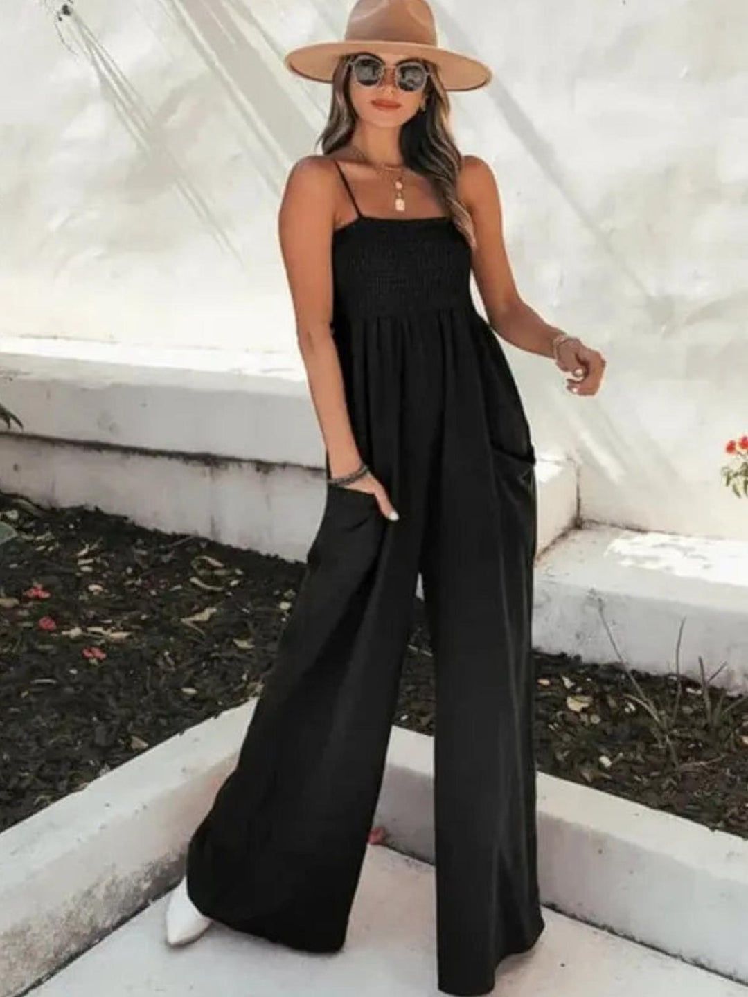 Woman wearing Black Jumpsuit Romper with relaxed, full-length | Lunova