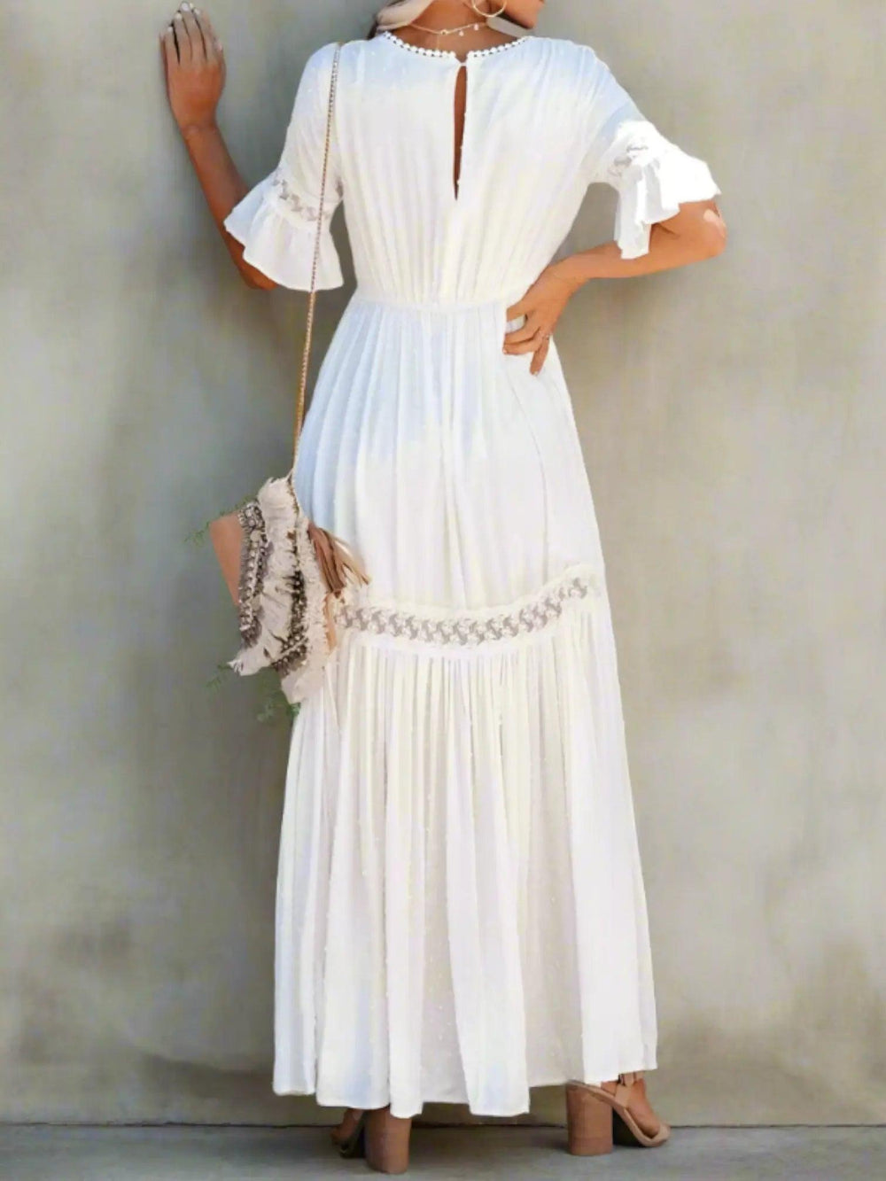Woman wearing Lace Maxi Dress with ruffled, V-neck — view 2 | Lunova