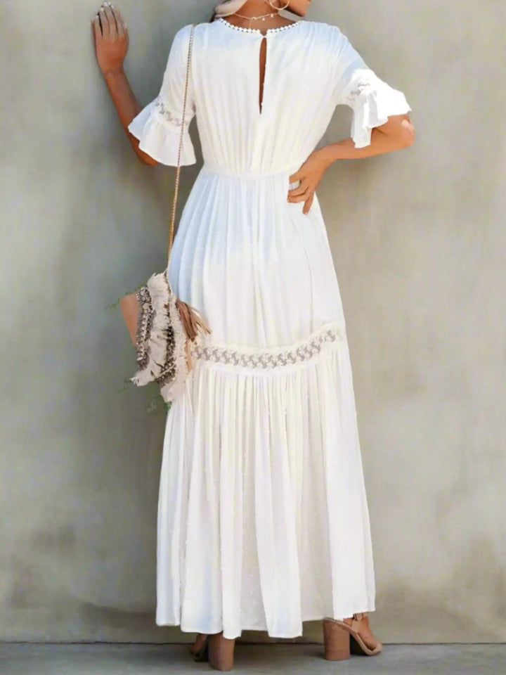 Woman wearing Lace Maxi Dress with ruffled, V-neck — view 2 | Lunova