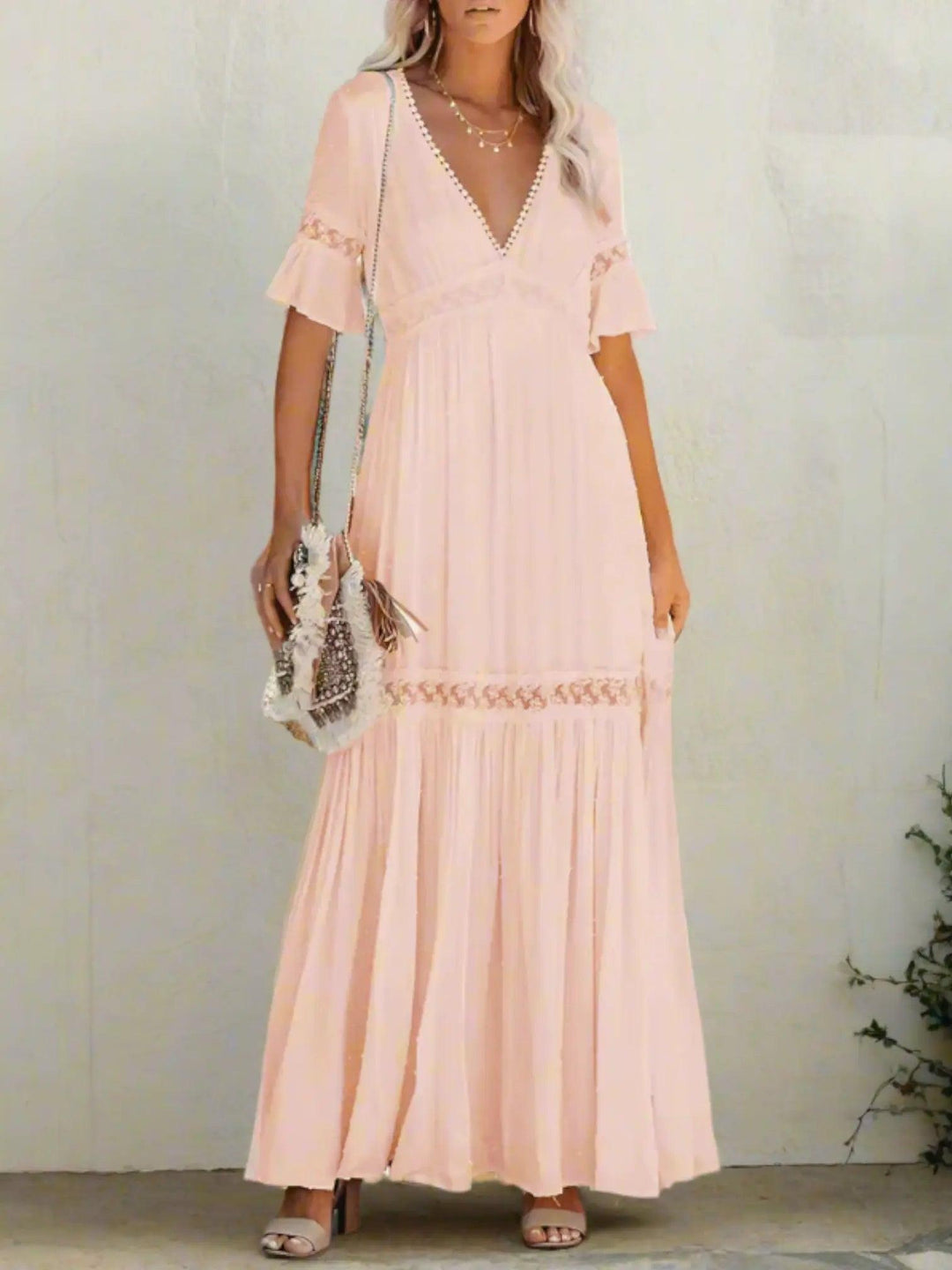 Woman wearing Pink Lace Maxi Dress with ruffled, V-neck | Lunova