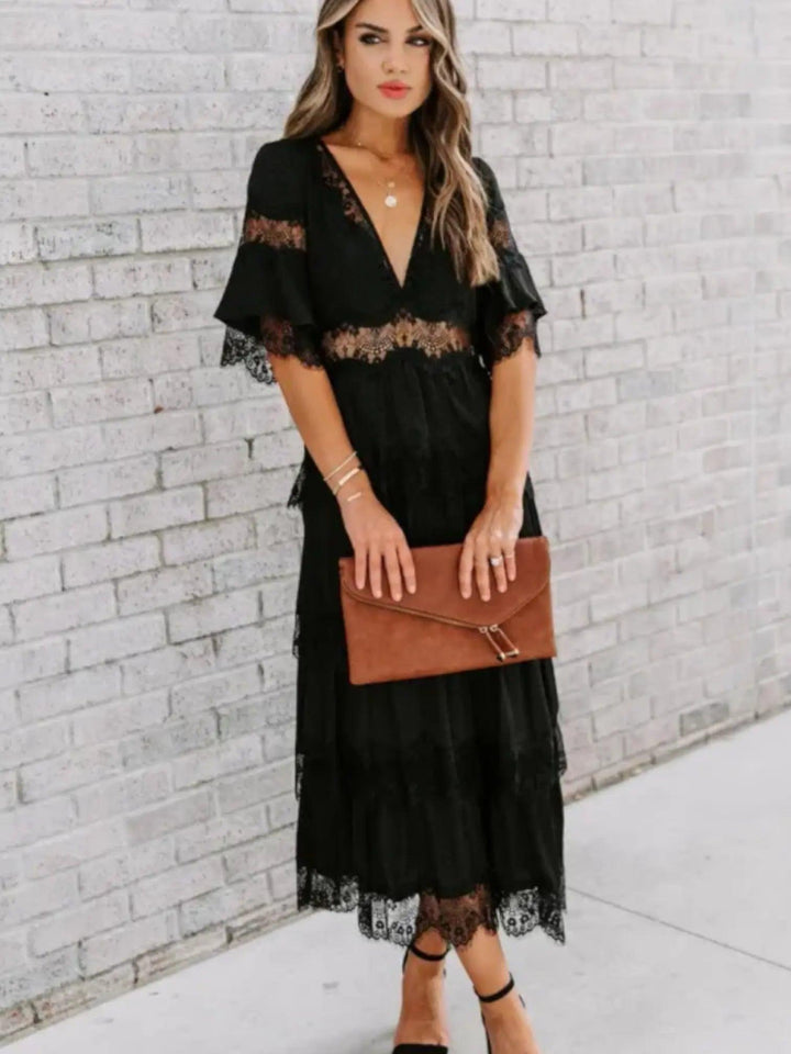Woman wearing Black Lace Maxi Dress with ruffled, V-neck | Lunova