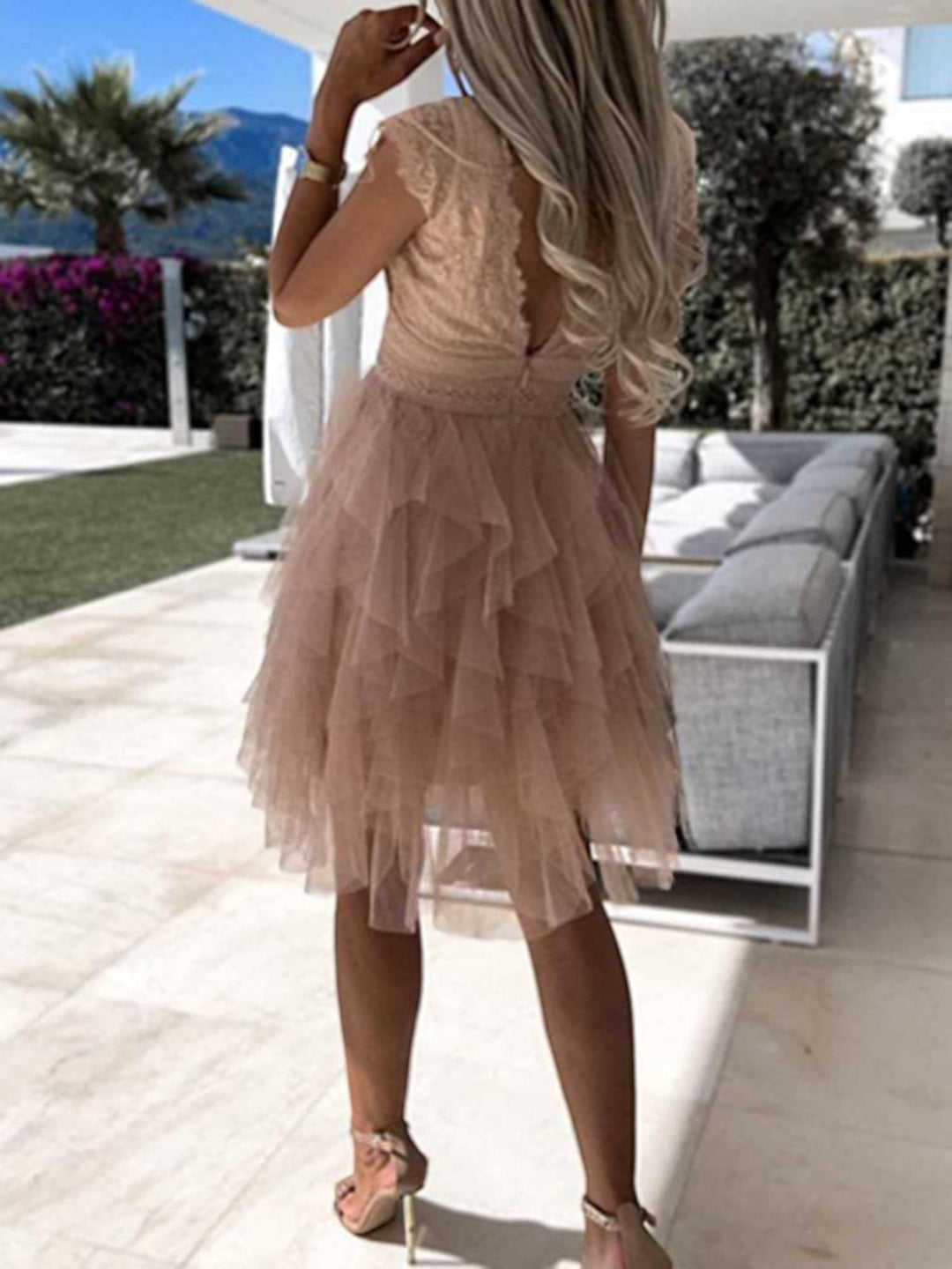 Woman wearing Lace Tiered Mini Dress with A-line, lace — view 3 | Lunova