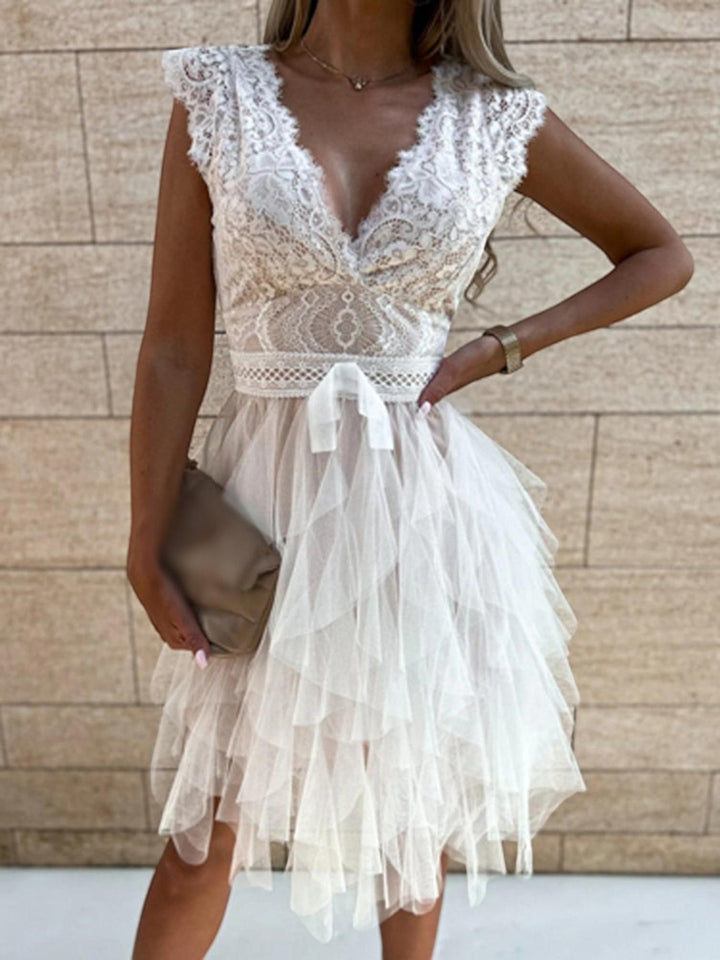 Woman wearing Lace Tiered Mini Dress with A-line, lace — view 4 | Lunova
