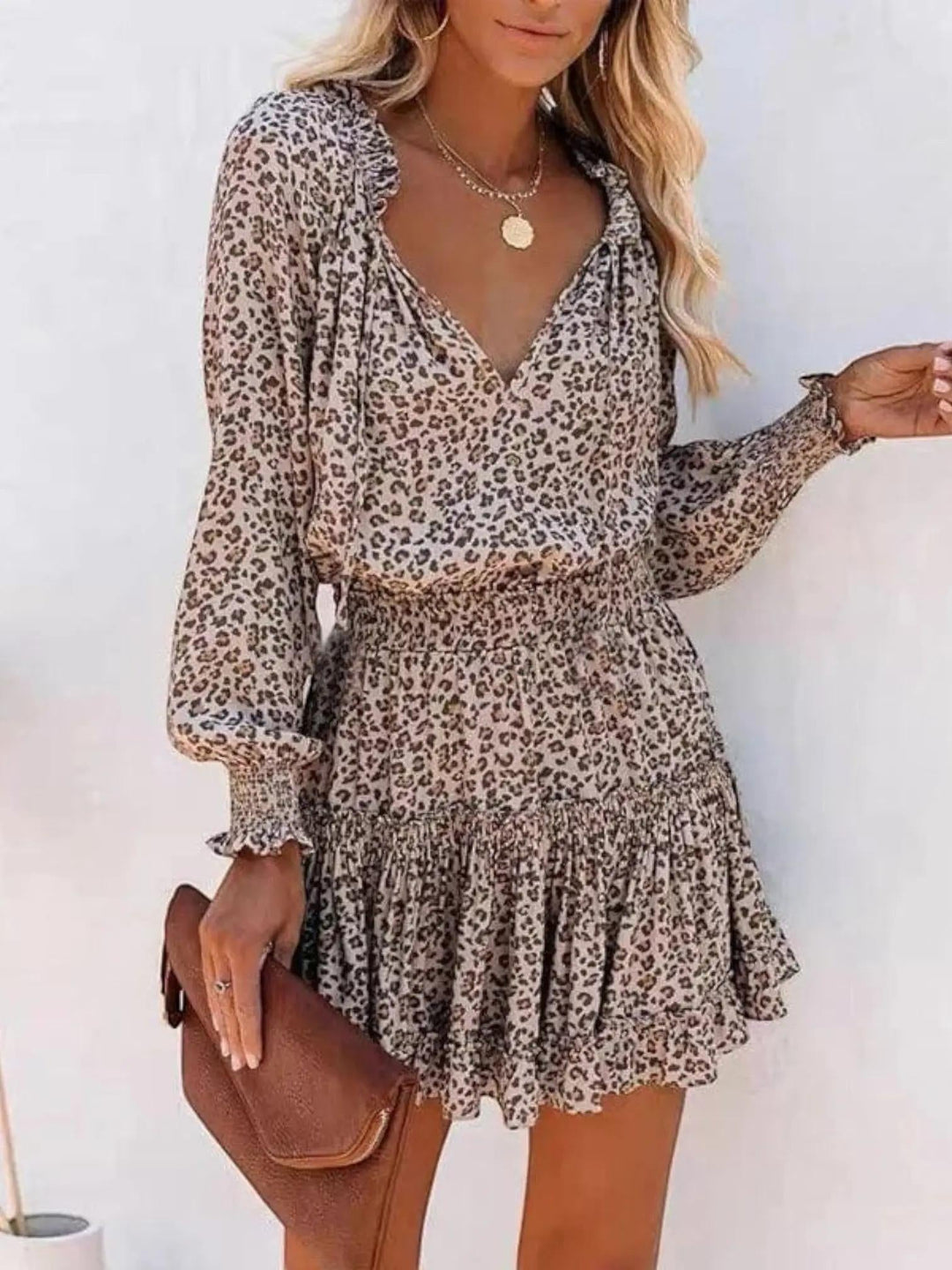 Woman wearing Leopard Print Midi Dress with empire-waist, V-neck — view 2 | Lunova