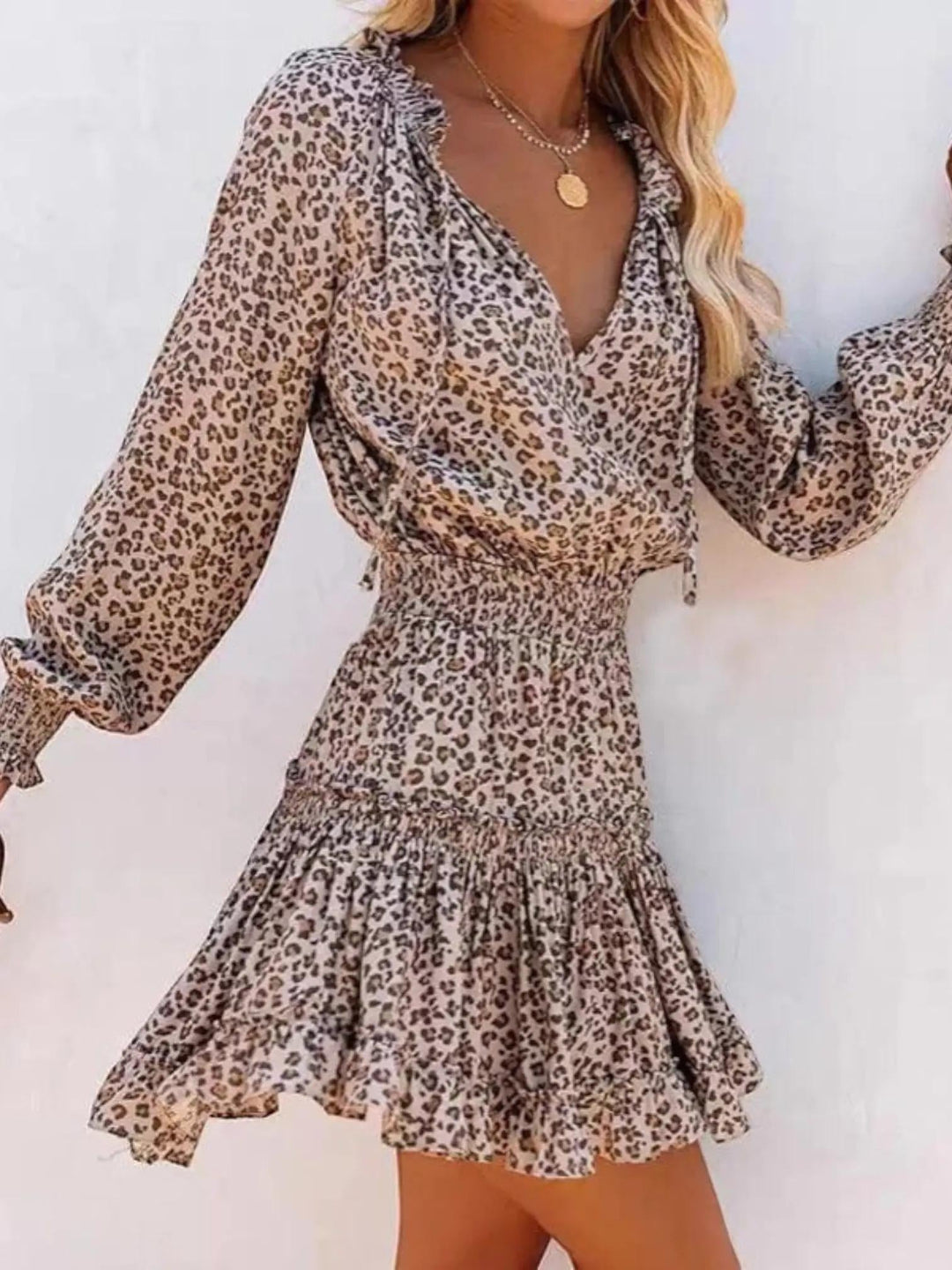 Woman wearing Leopard Print Midi Dress with empire-waist, V-neck — view 3 | Lunova