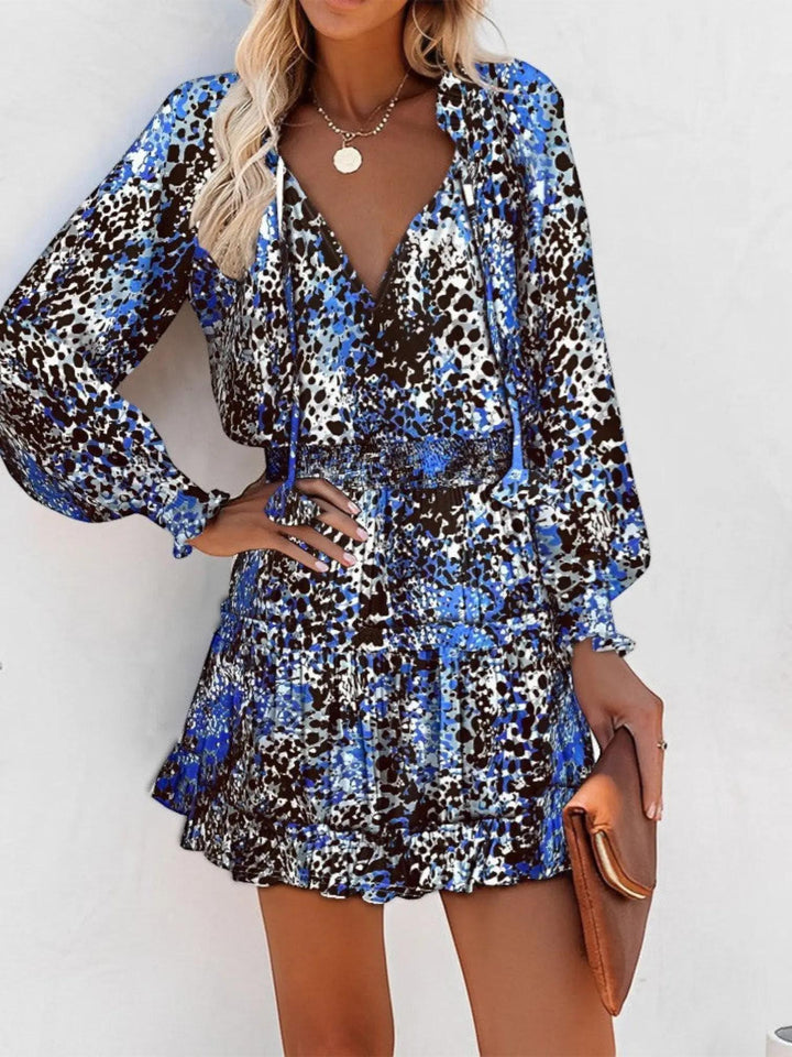 Woman wearing Blue Leopard Print Midi Dress with empire-waist, V-neck | Lunova