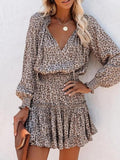 Woman wearing Leopard Print Midi Dress with empire-waist, V-neck | Lunova