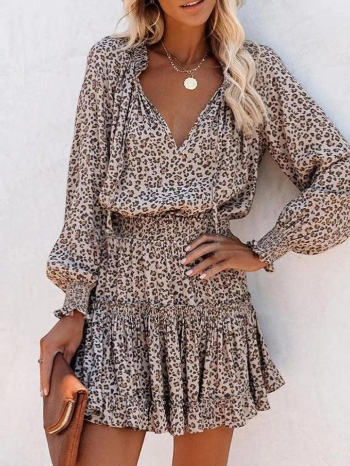 Woman wearing Leopard Print Midi Dress with empire-waist, V-neck | Lunova
